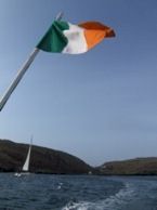 Flag of Ireland flying on ferry as it leaves Cape Clear, co Cork.