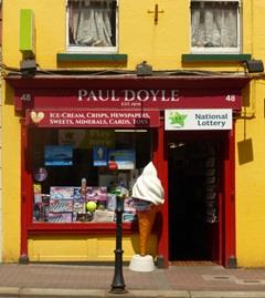 Frontage of newsagents and toys shop in Arklow, Co Wicklow, Ireland. Name of proprietor Paul Doyle, across top of frontage.
