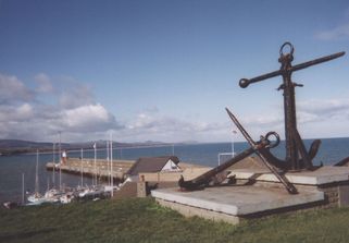 View over Wicklow Harbour, with huge old anchors in the foreground.