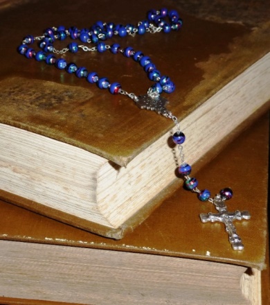 Old Irish Catholic parish registers (closed) with rosary