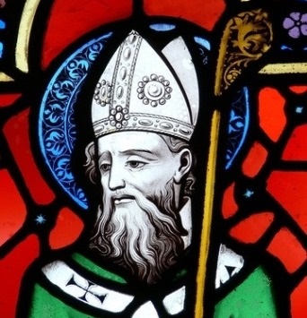 Stained glass window depiction of St Patrick