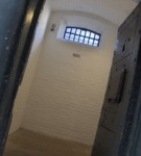 View into prison cell at Kilmainham Gaol, Dublin.