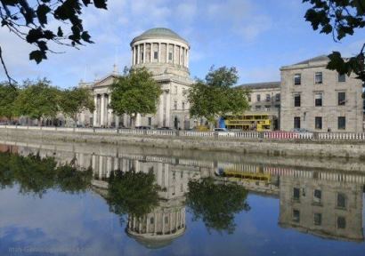 The Four Courts Building, reflecting in the River Liffey, Dublin.